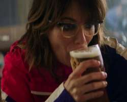 Lena Headey consuming alcohol